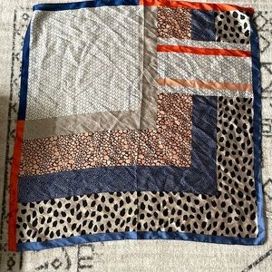 can be used as a hair scarf, tied on a purse, or as a top